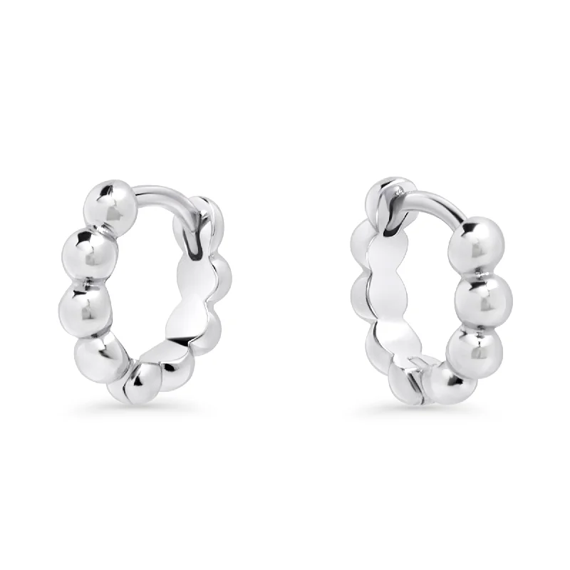 Hoop earrings with satin finishes for a smooth and elegant appearance-Byza Huggie Earrings