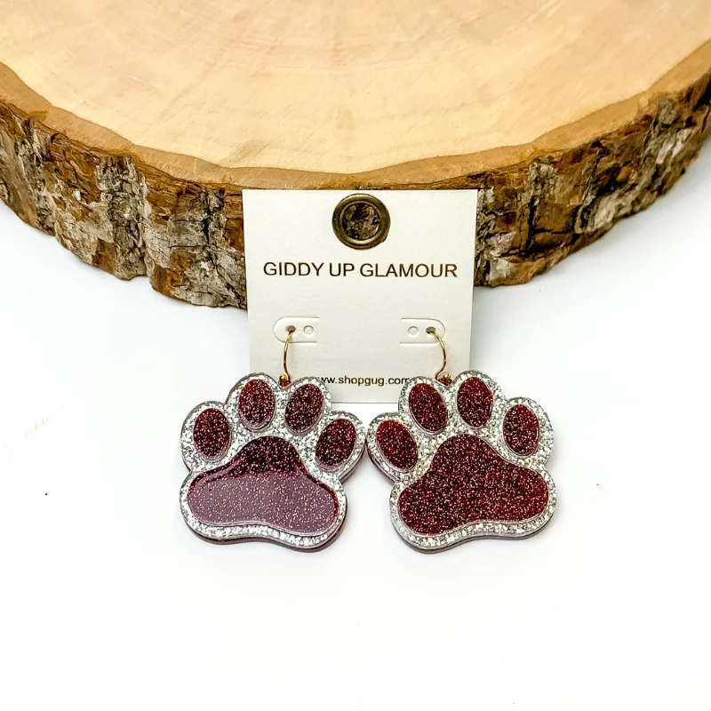 Hoop earrings with resin accents for a bold and colorful design-Glitter Paw Print Earrings in Maroon with Silver Glitter Outlining